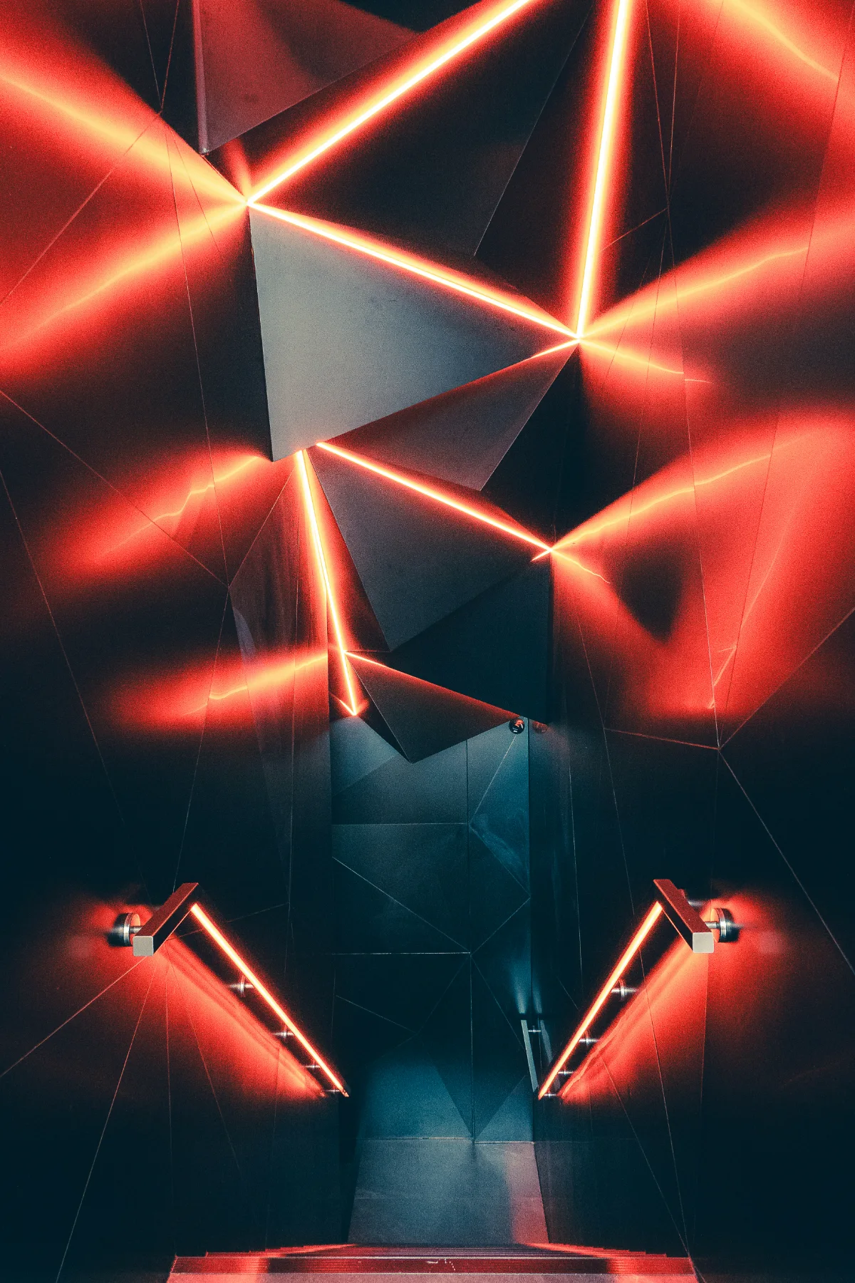Angular architecture illuminated by intersecting red light